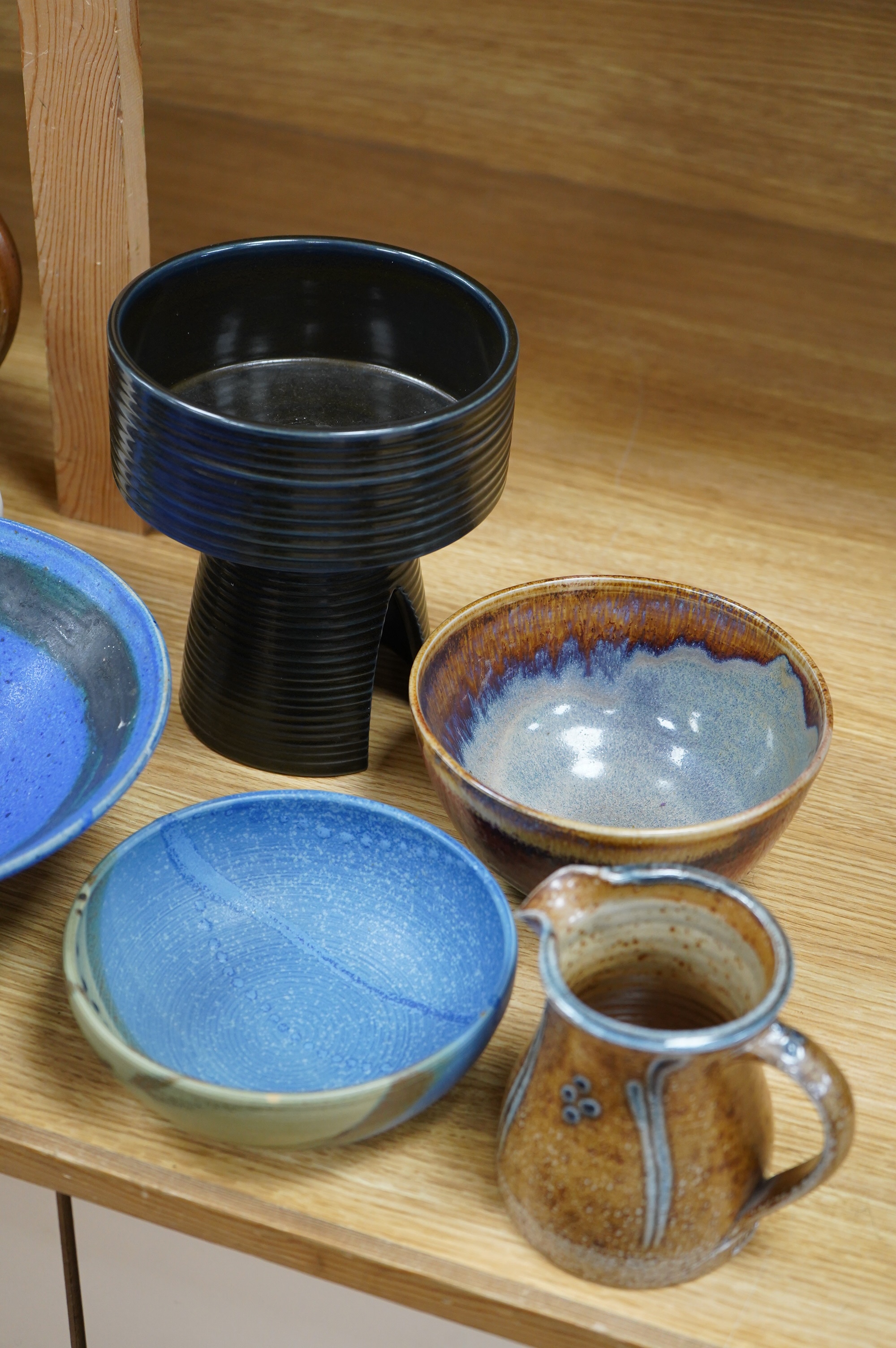A collection of fourteen mixed studio pottery vases, bowls and jugs etc. Condition - good